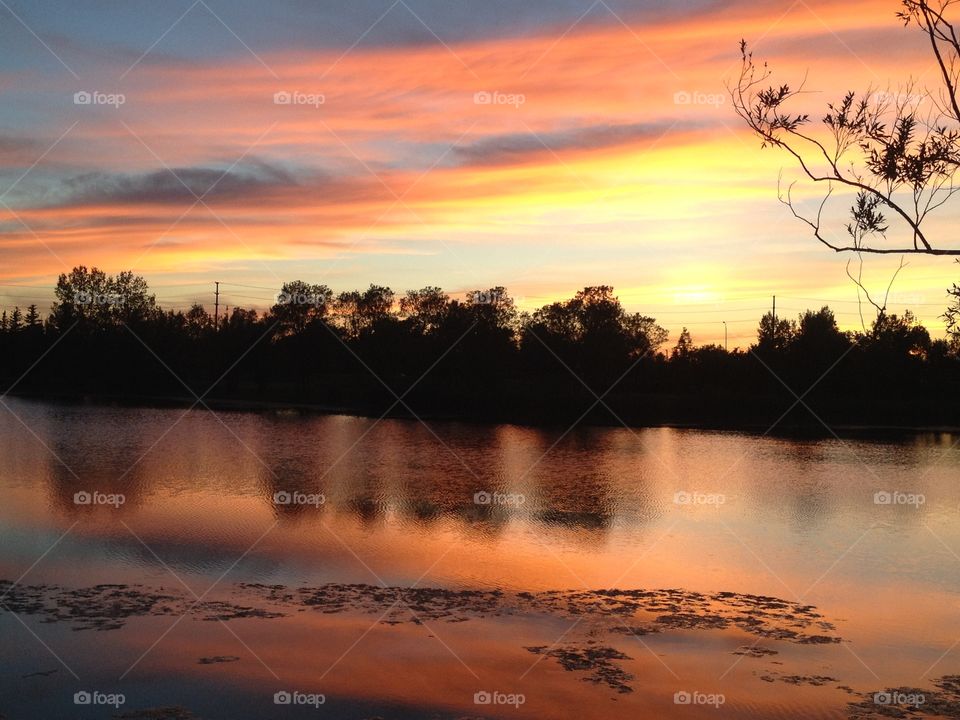 Reflection of dramatic sky on lake