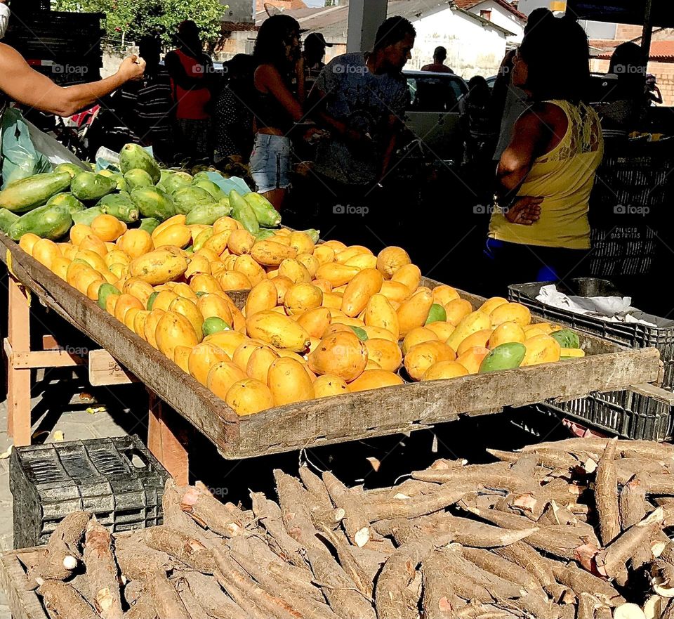 tray with papaya at a fruit market in Bahia, Brazil