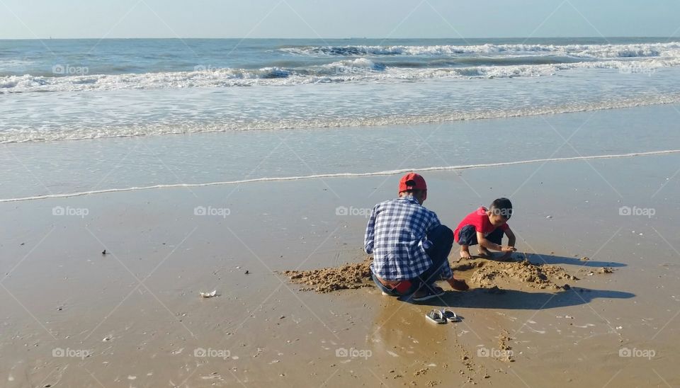 Playing on a beach.