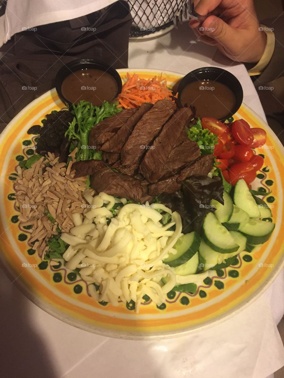Colorful, beautifully artistically placed plate of food. Fresh and well prepared steak salad