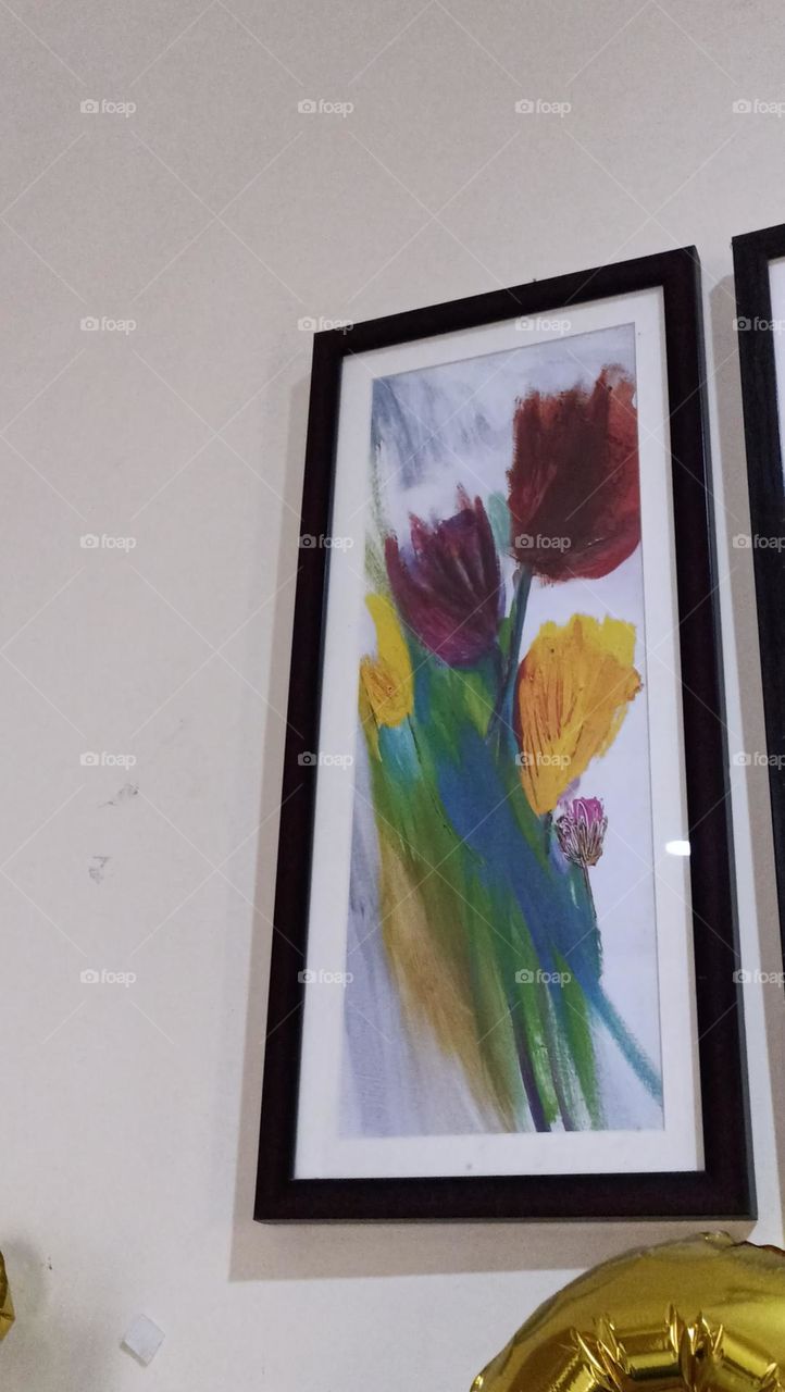 an art piece purchased from the market as a wall decor,to make the house more beautiful and sober.