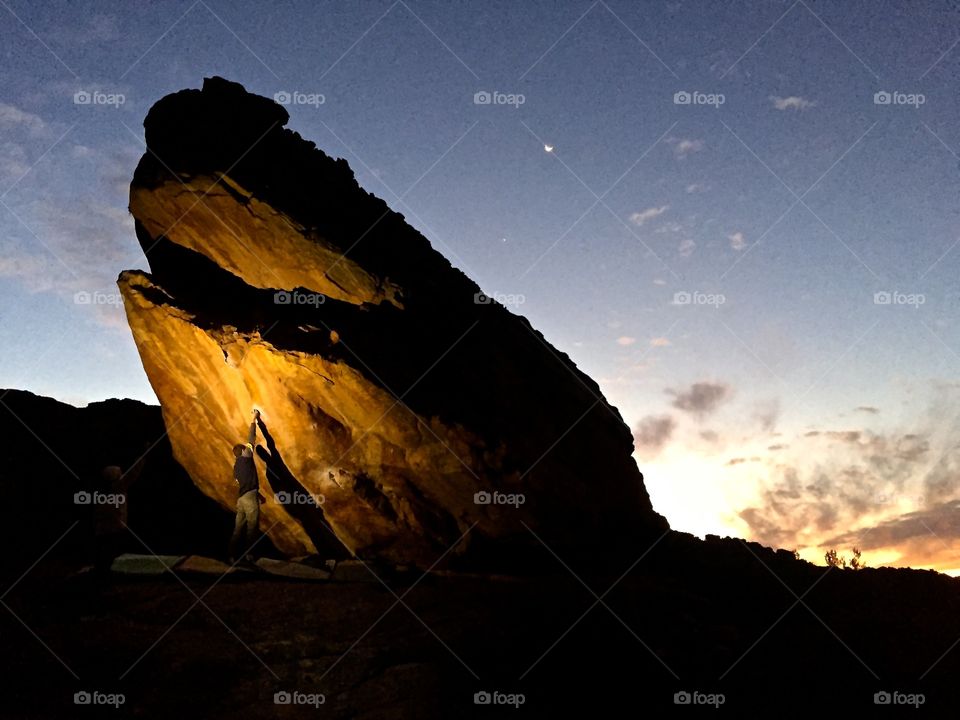 Late Shoshaloza . A climber preps Shoshaloza as the sun sets.