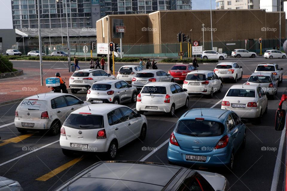 cars stuck in traffic during the rainy season