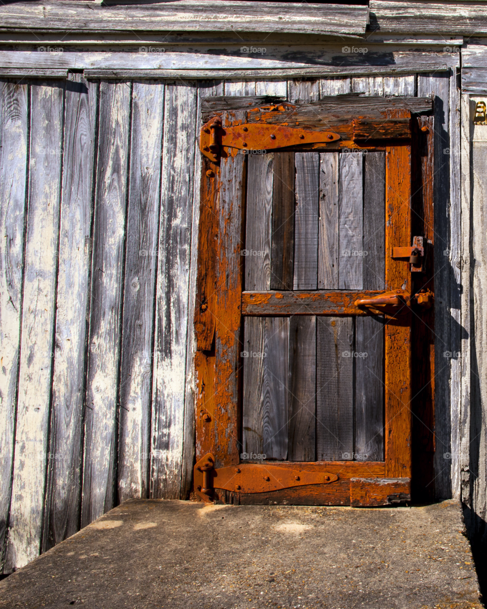 orange door old ice storage by brolfson