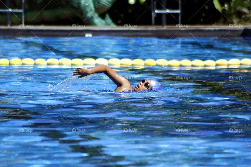 a swimmer in a swimming pool
