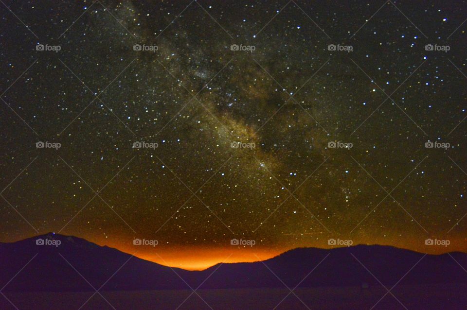 Skyfall. The Milky Way over Humphrey's Peak with Flagstaff shining through