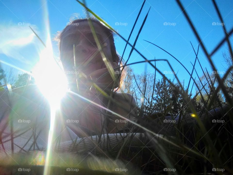 girl relaxing in nature spring and summer time isolation social distance