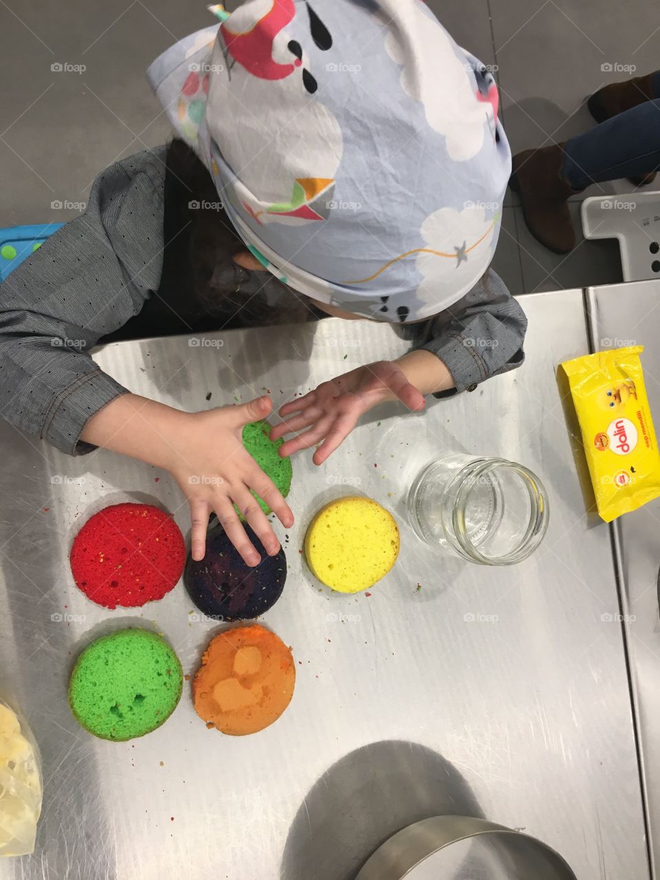 Colorful cupcakes  and little chef
