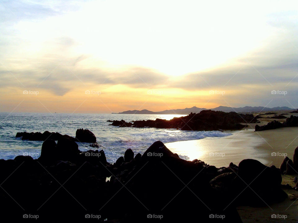 sea serf sand rocks sun sky clouds mexico by angeljack