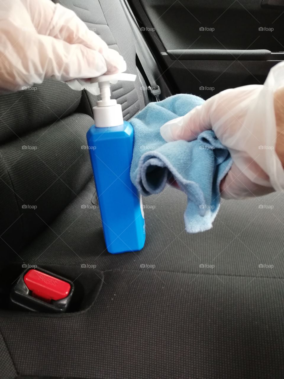 Sanitizing the backseat of the car