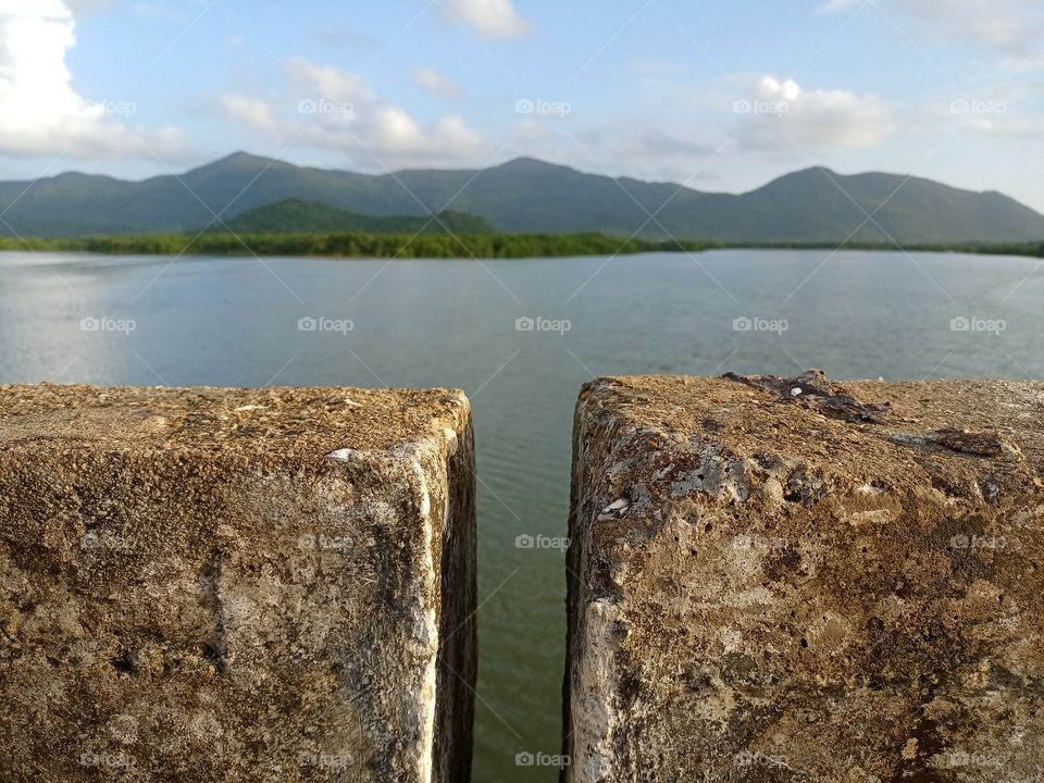 mountain lake view in middle of to side wall