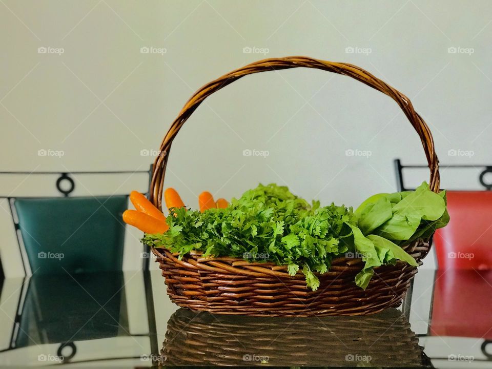 Eco friendly wooden bamboo basket with full of vegetables 