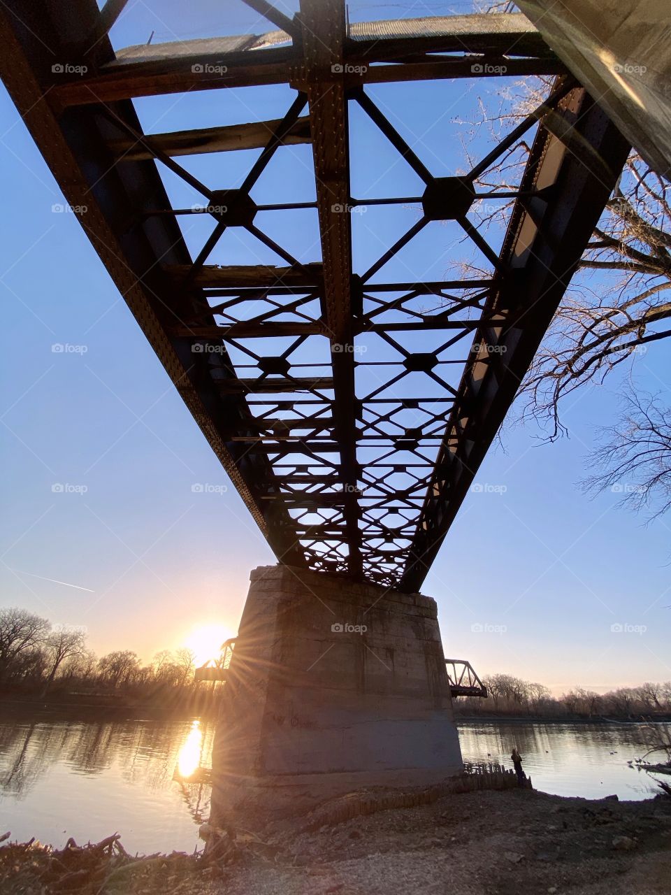 Train bridge at sunset 