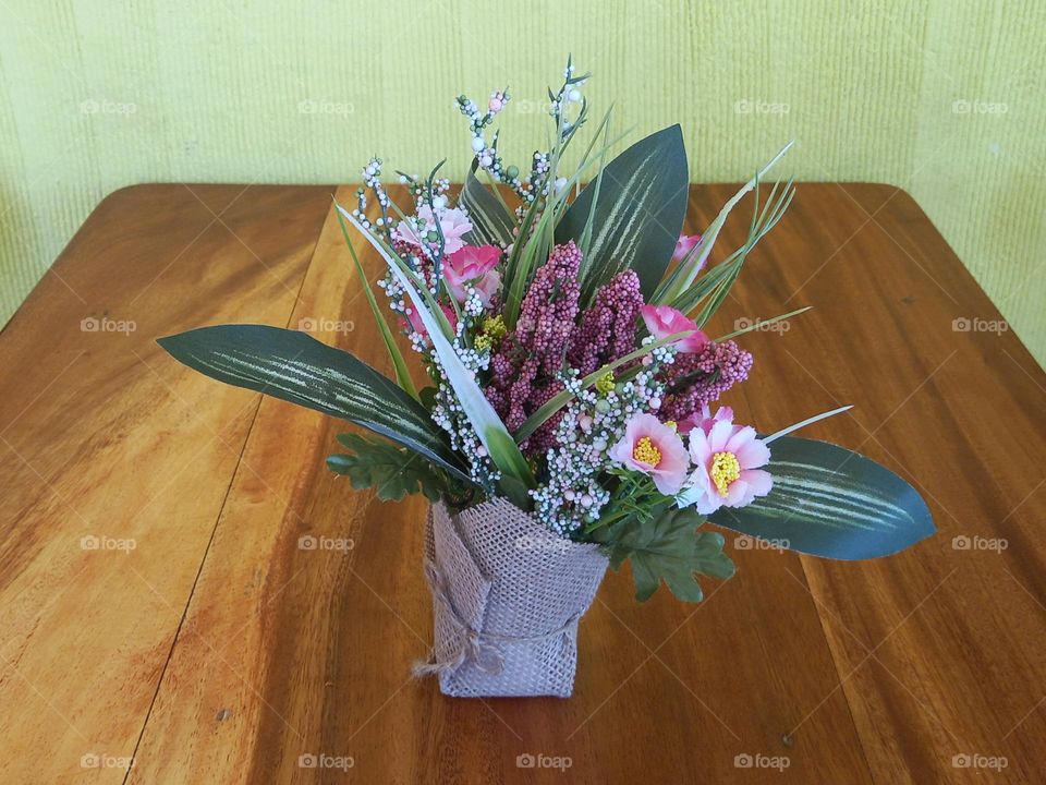 pot with artificial flowers
