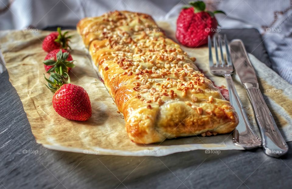 Strawberry and chocolate stuffed puff pastry braid