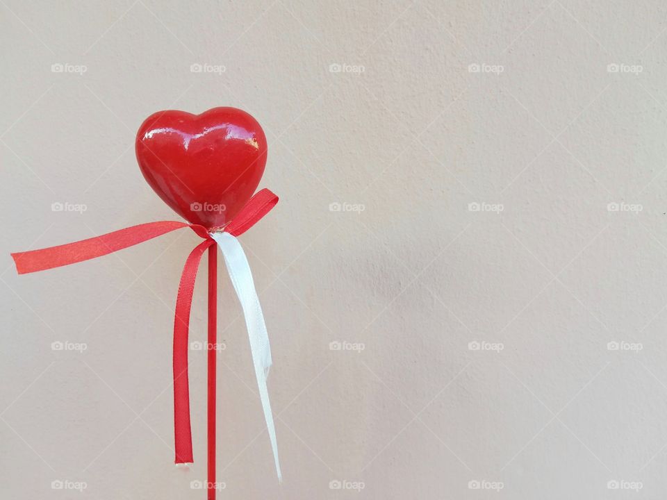 Red heart on a light background