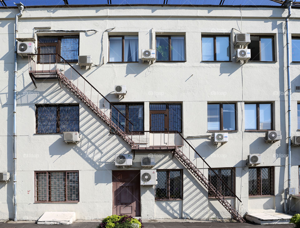 House with windows, stairs end shadows 