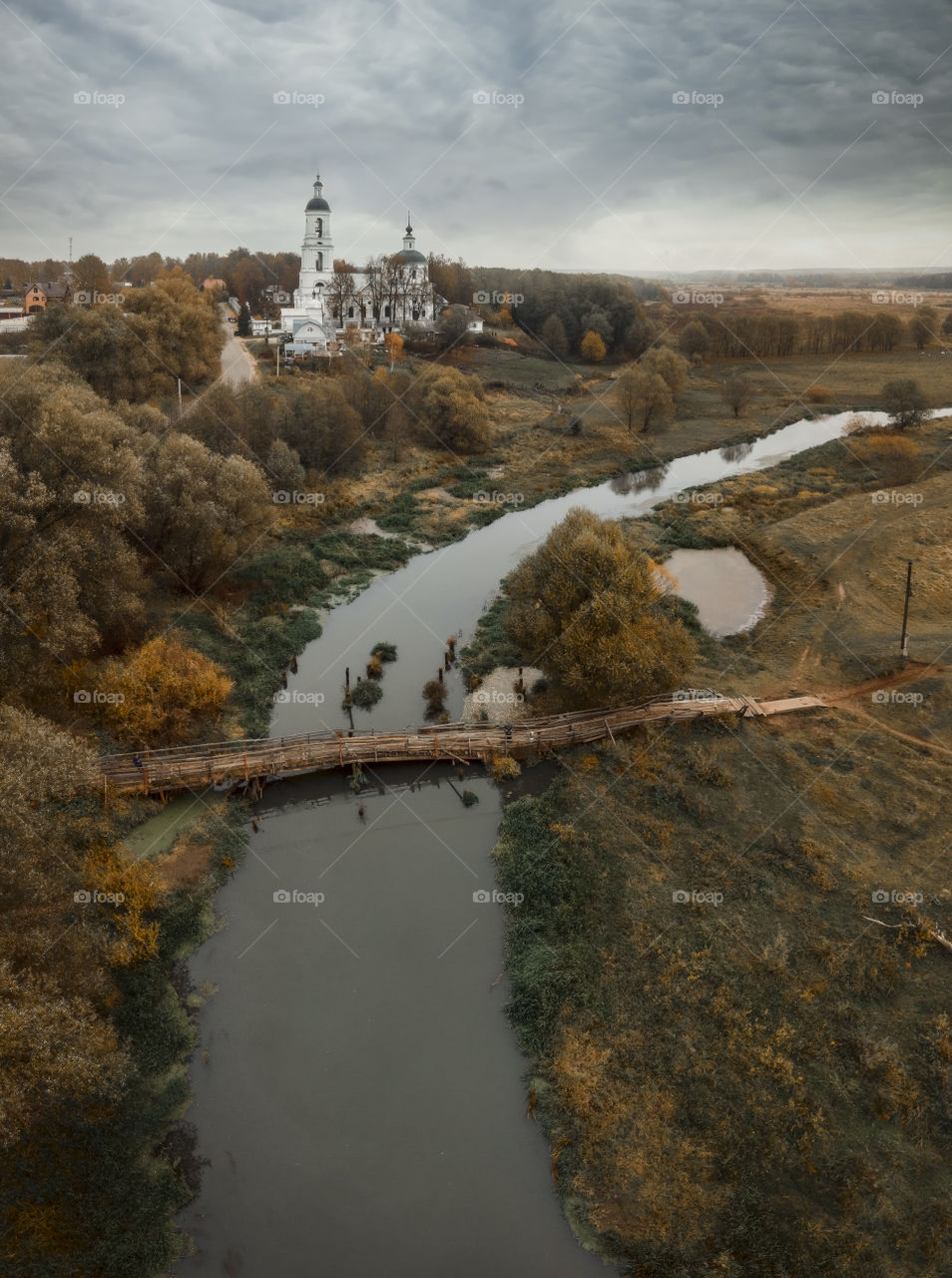 Orthodox Church on a river, autumn aerial landscape, Russia, Vladimir region 