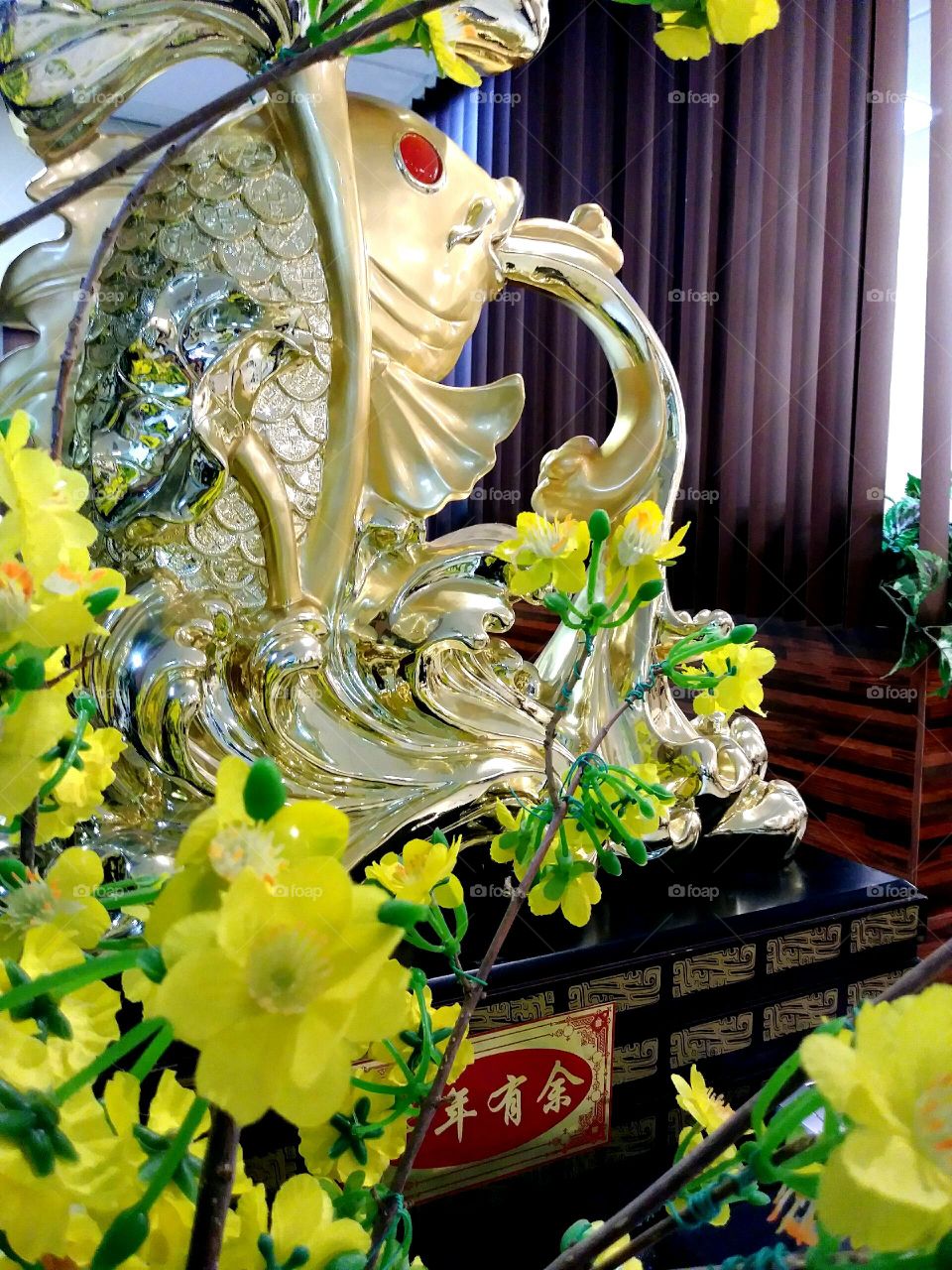 Gold Koi fish statue