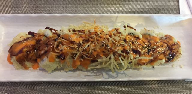 Crazy little boy sushi roll; a deep fried California roll with a little kick!