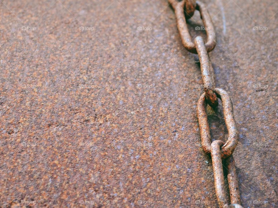 Rustic texture with a chain