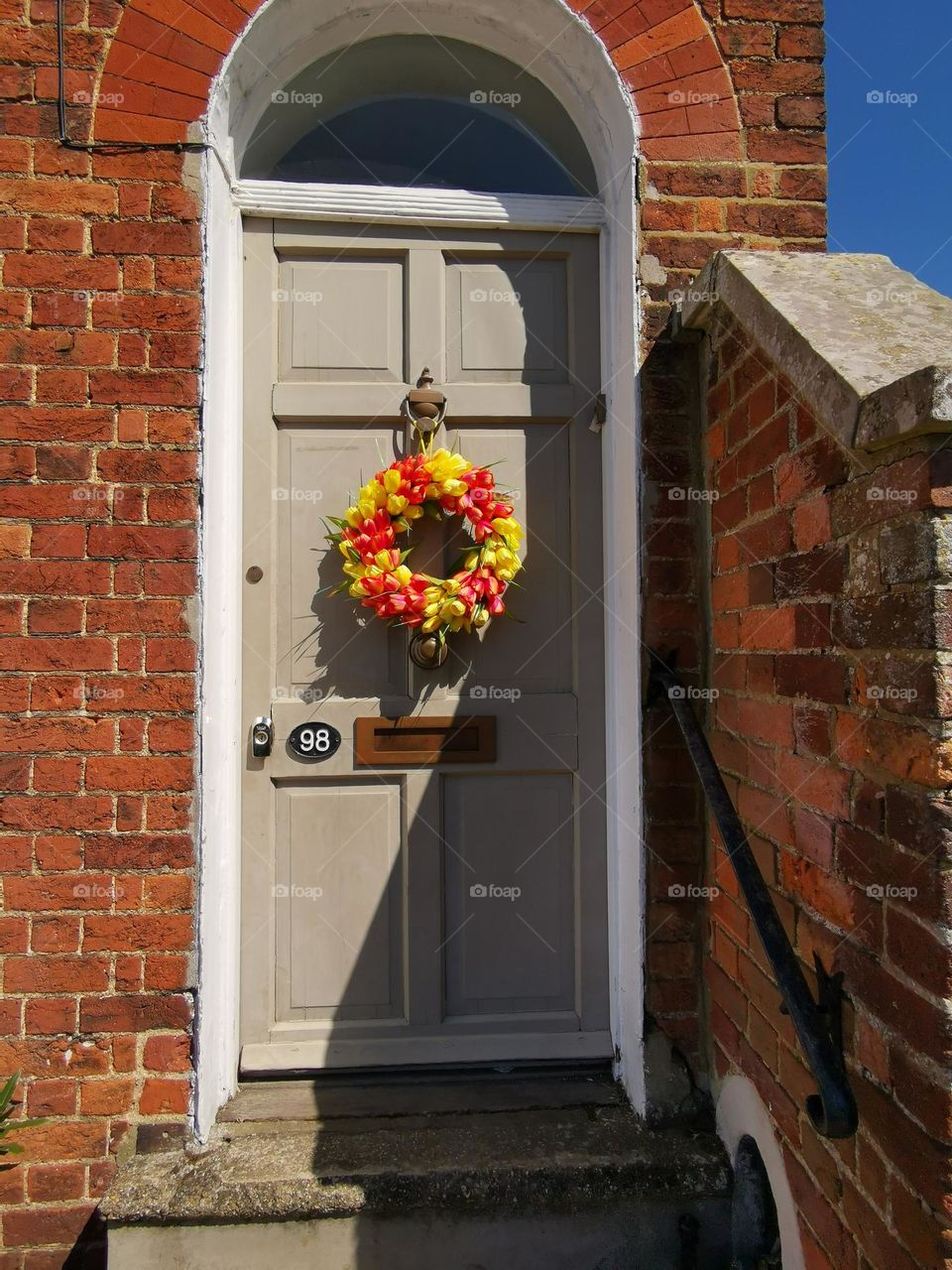 Doors decorated with Easter wreath.