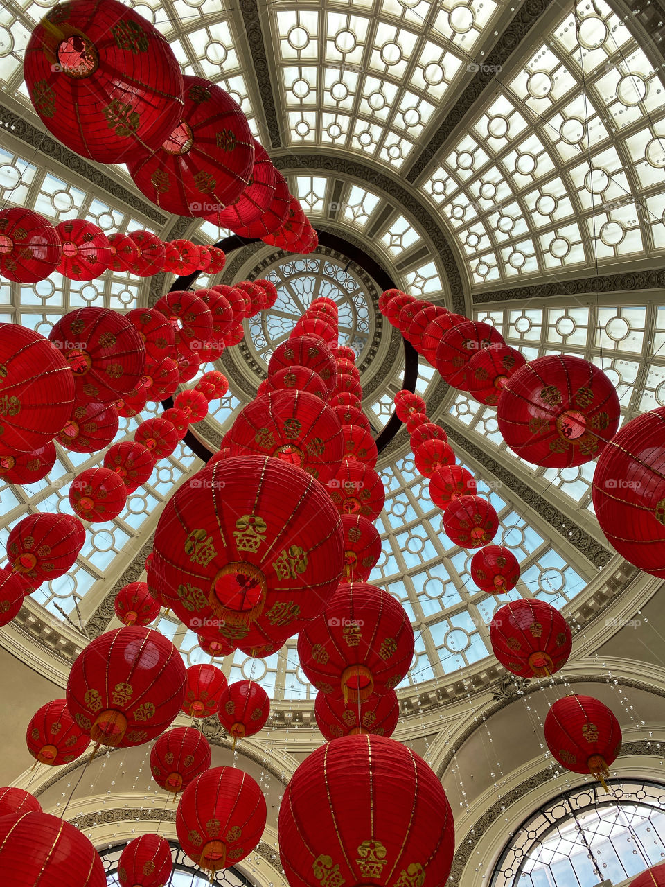 Red lantern decorations for Chinese New Year hung in a shopping mall atrium 
