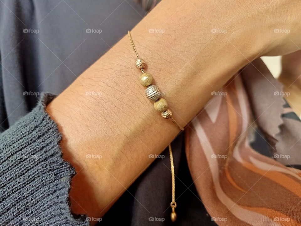 Close-up of bracelet on woman's hand
