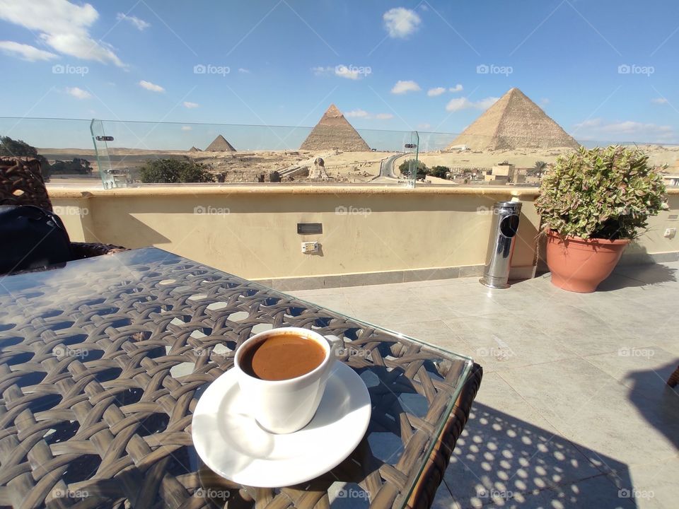 a great day in Great Giza Pyramids morning drinks coffee & and Egyptian tea with mint 
this is Egyp