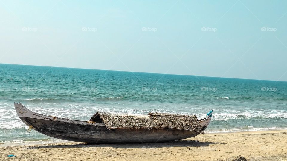 boat on a beach.