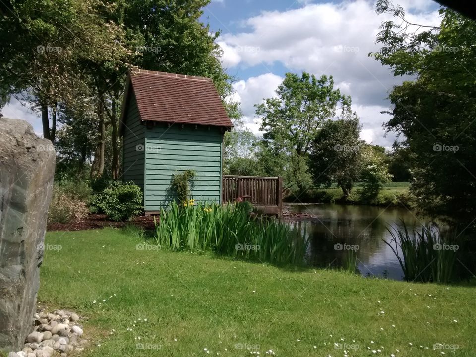 Hut by the pond