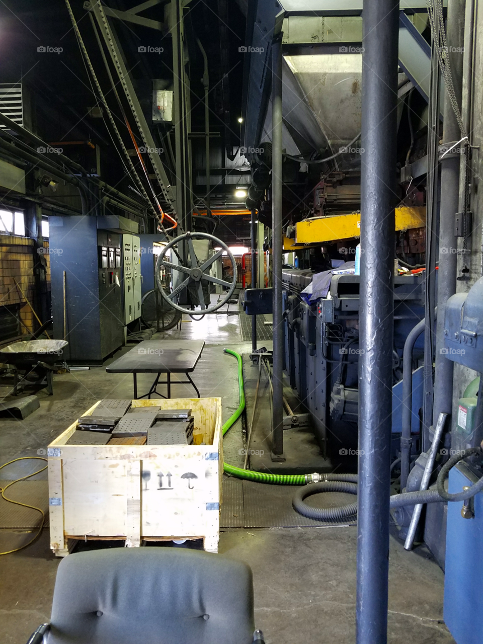 The long walk. Boilers lining the walkway dormant during the summer months.