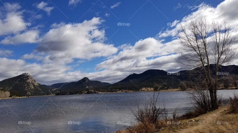 beautiful clear sky with clouds on a crisp autumn day in colorado