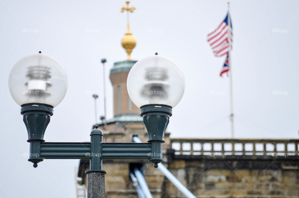 Double light post in front of the Roebling bridge in Cincinnati, Ohio 