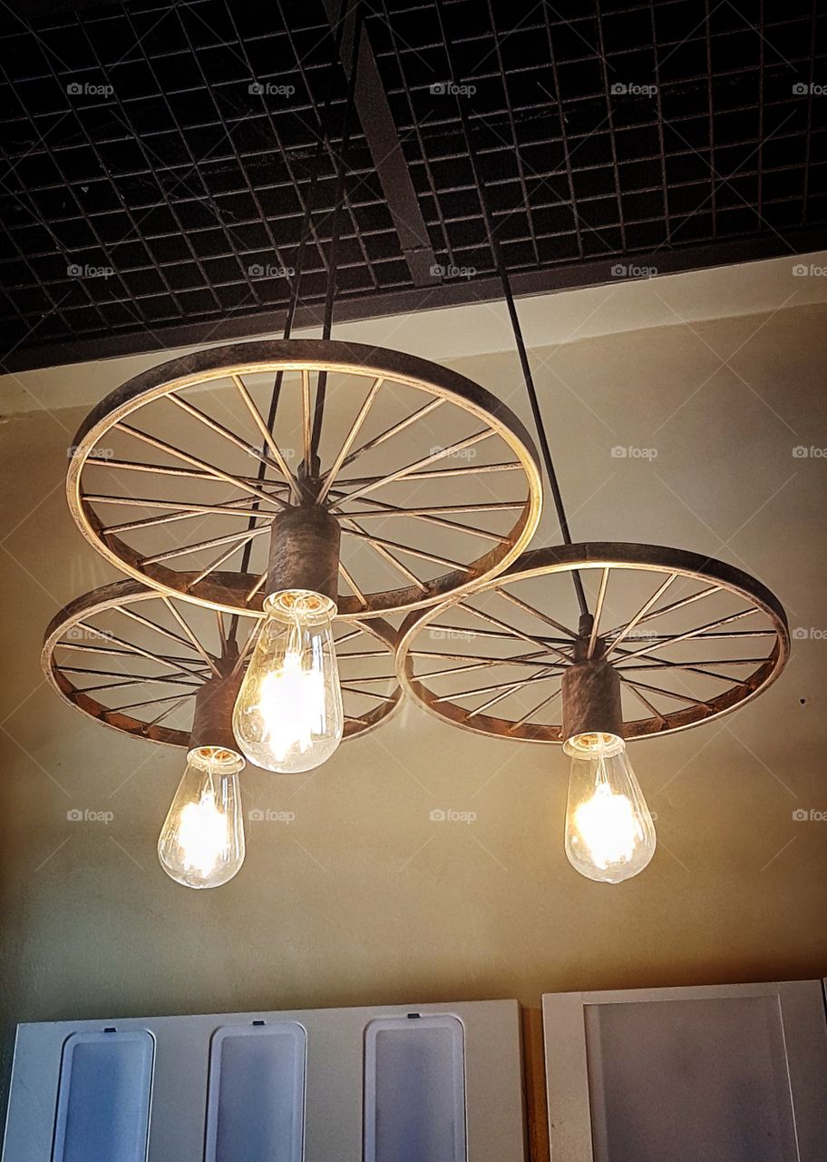 rustic wheel drop light chandelier