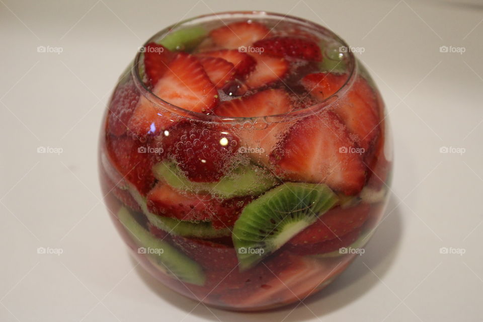 strawberries and kiwis in bowl