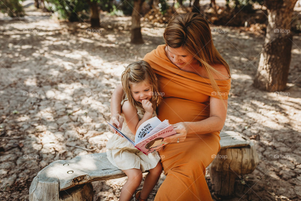 Mom reading with child 