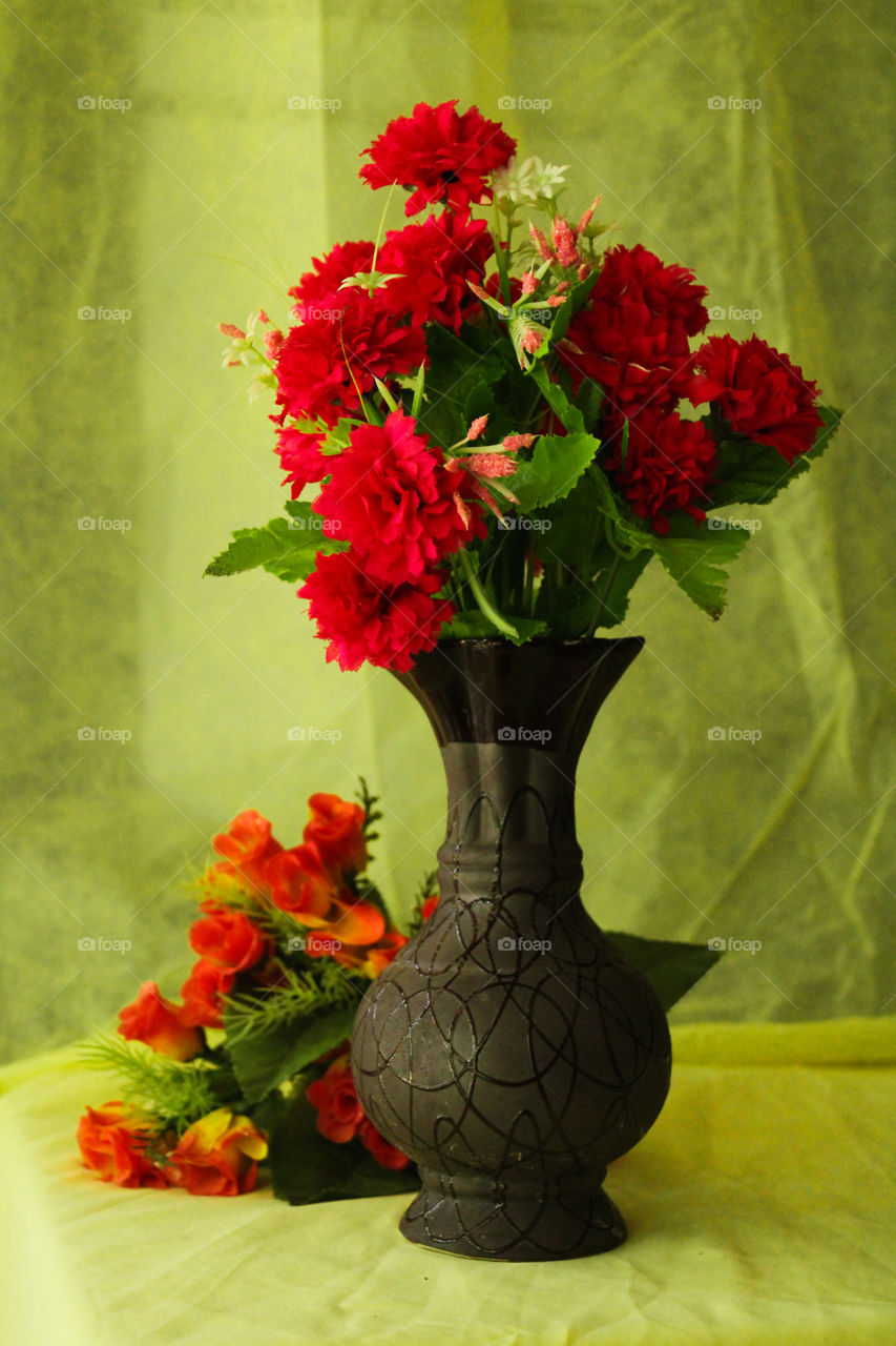 flower vase with yellow background