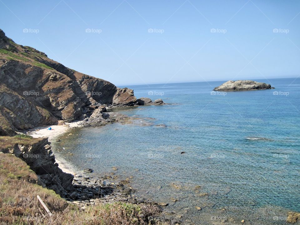 cliff And White Sandy beach in the mediterranean sea