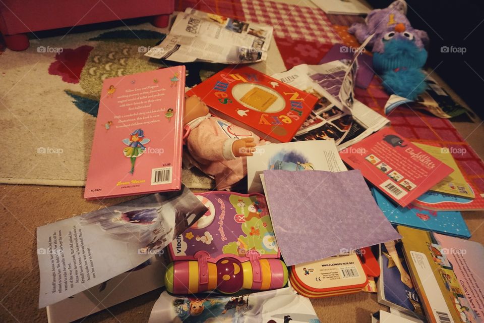 Toys and books on the floor