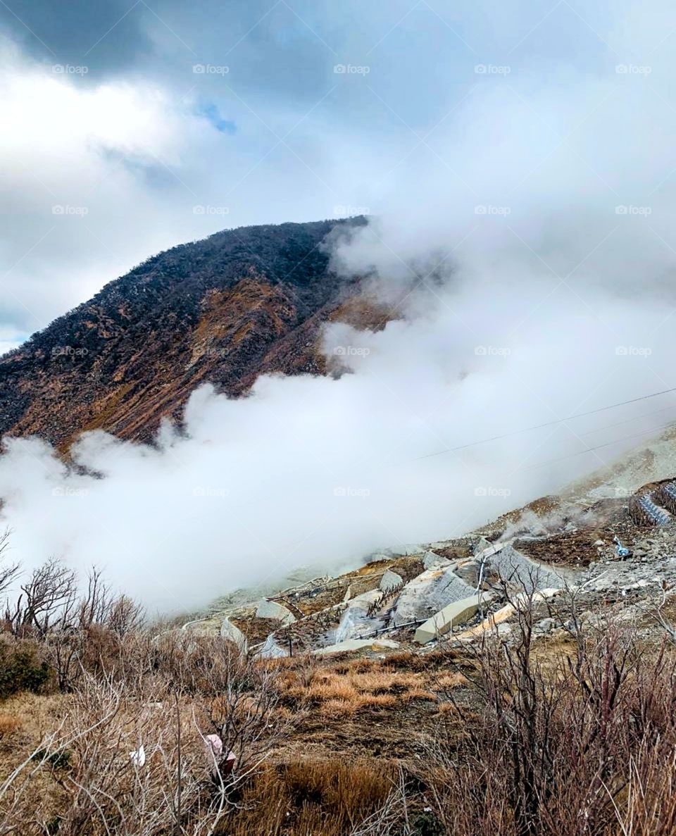 beautiful foggy season with mountain view