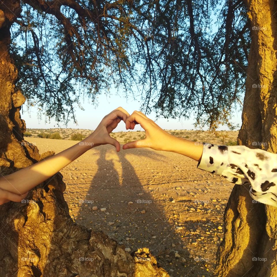 A heart made of human hands