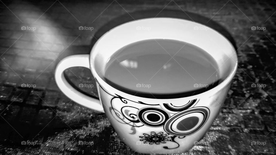 black  and white coffee cup