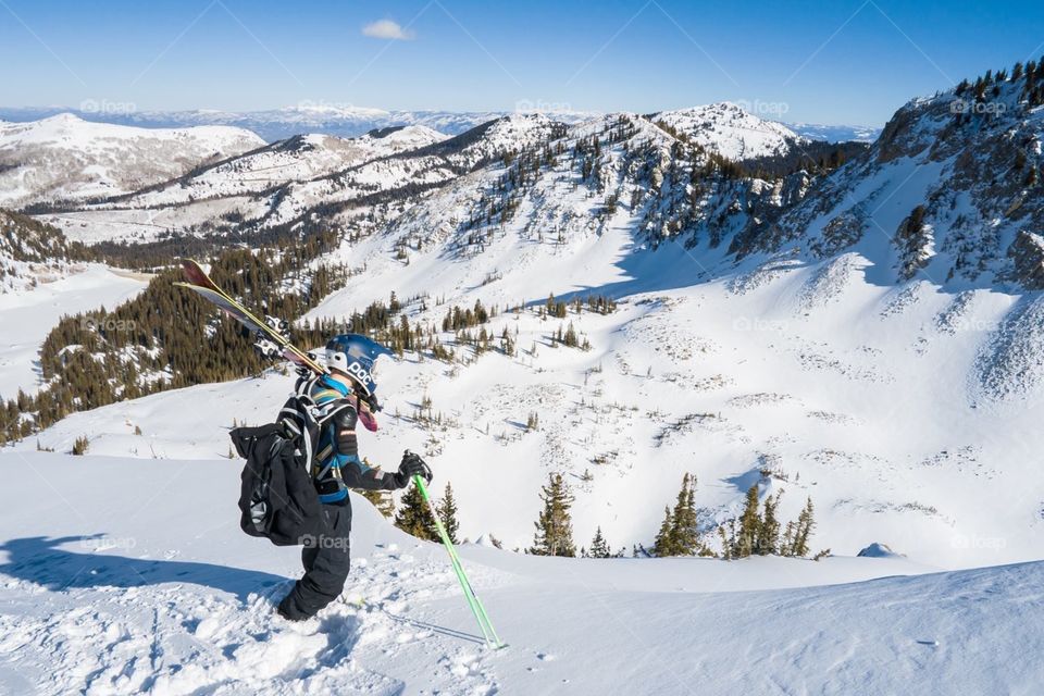 skiing in the mountains with fresh poweder