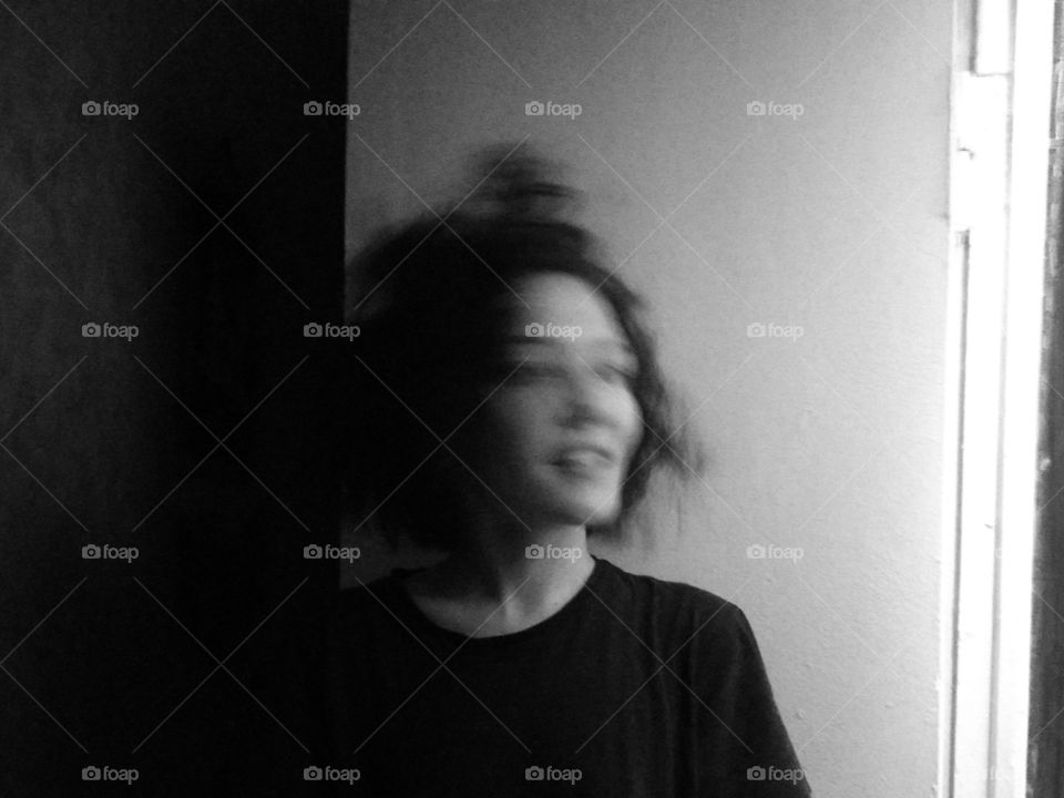 Black and white portrait. Motion. Girl.