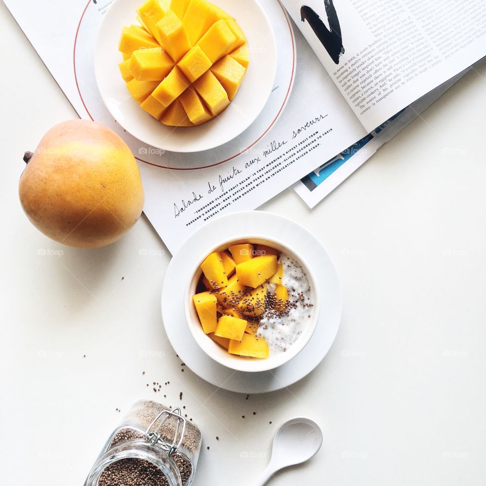 Healthy breakfast with R2E2 mango, yogurt, ground chai seed and perilla seed.