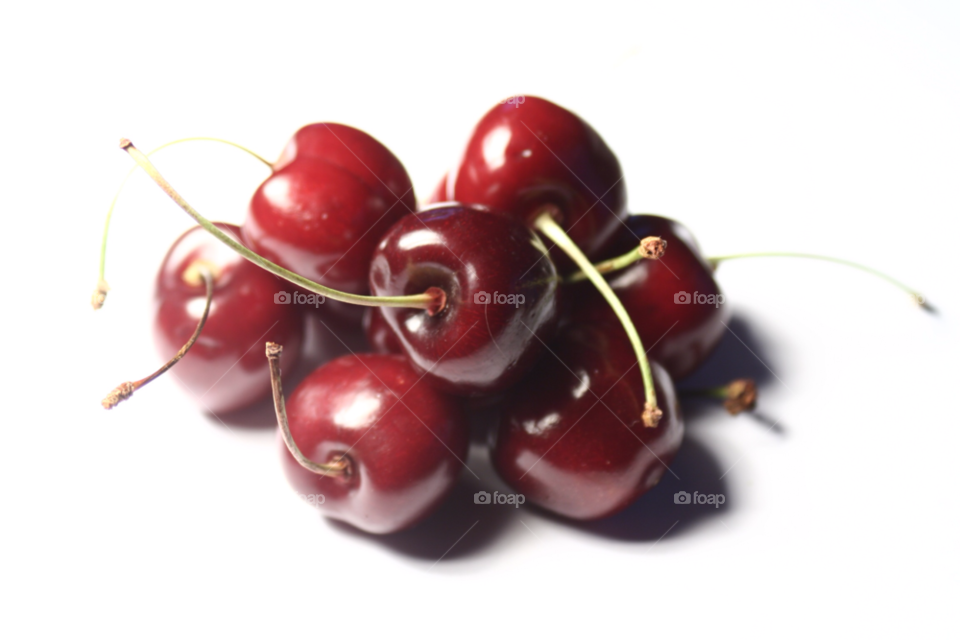 red white cherries fruit by adrianocastelli