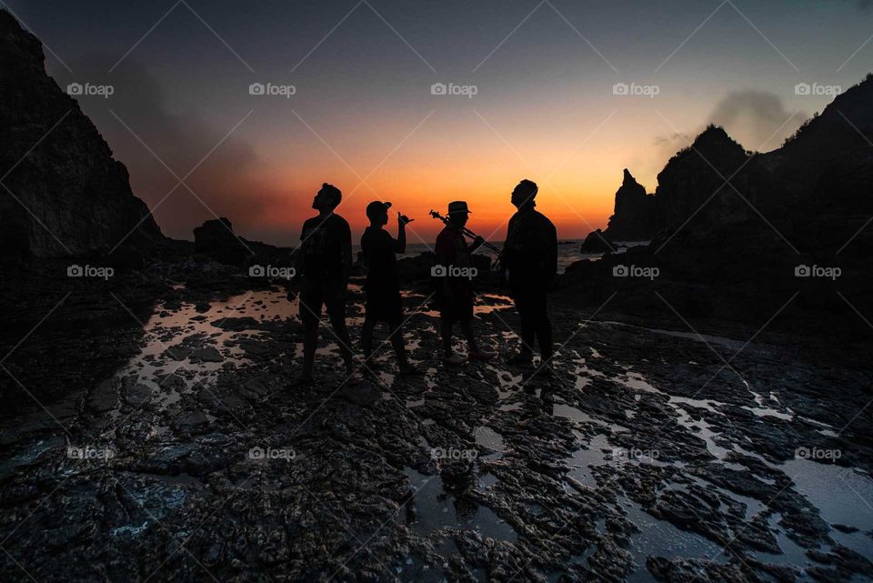 men behind the sun light of Stone Barn - Watu Lumbung