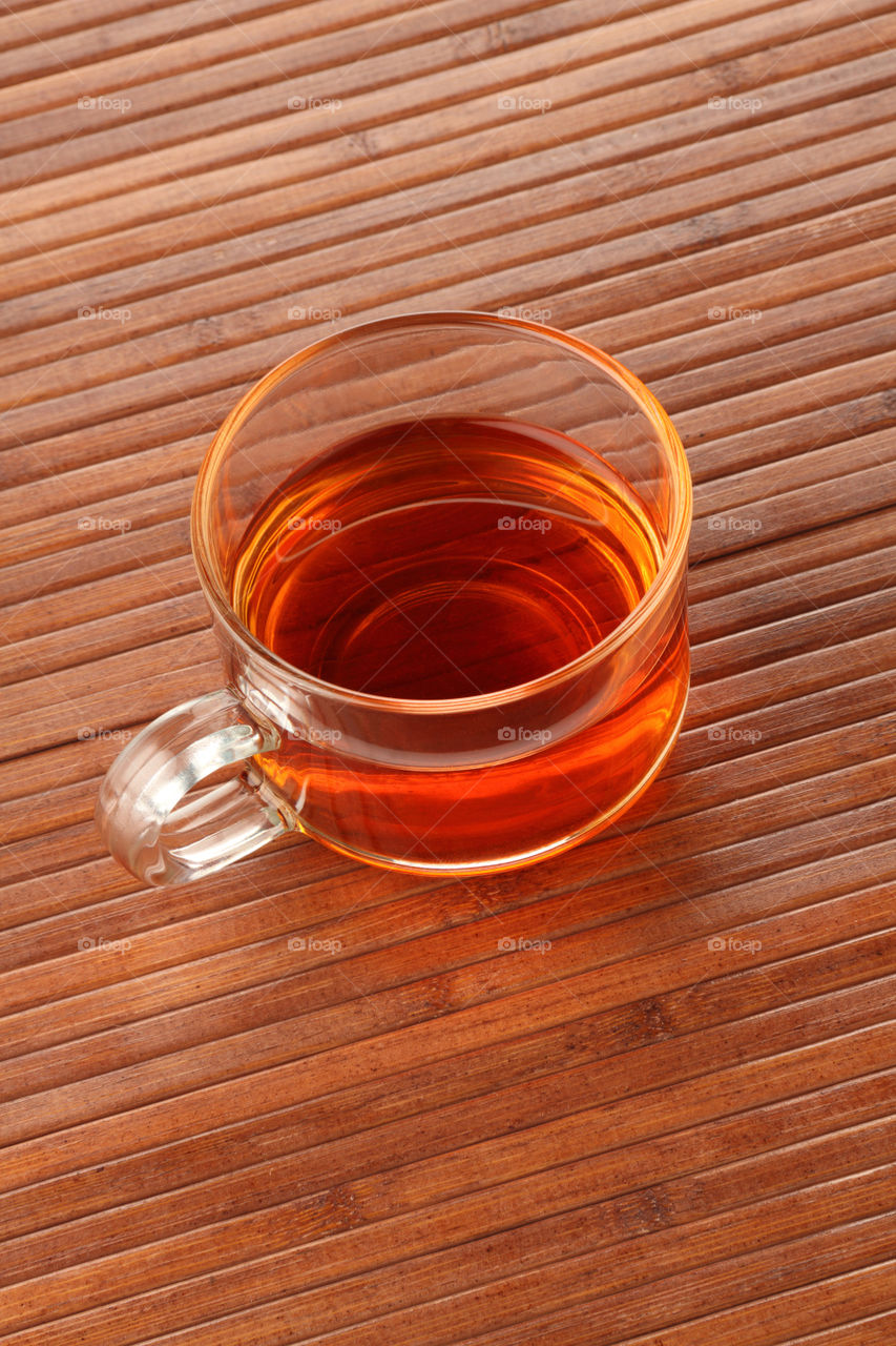 A cup of tea on wooden background