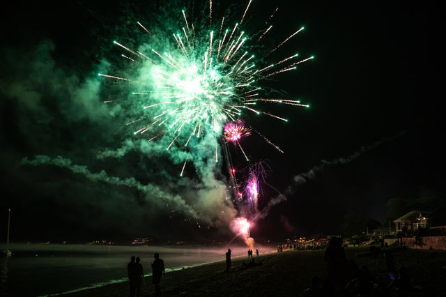 Fireworks on the coast reflection